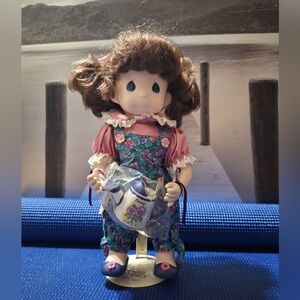 Precious Moments Doll with Brown Hair and Floral Outfit July